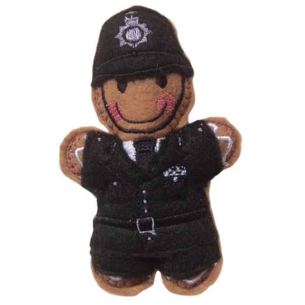 Traditional Police uniform felt gingerbread man decoration, on white background.